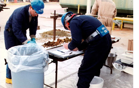 Environmental Monitoring image of Technicians process soil samples
