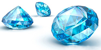 Image with three blue cut gemstones on a white background.